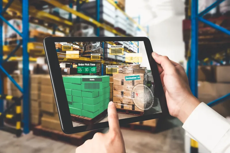 Warehouse Manager Using Digital Tablet For Inventory Management