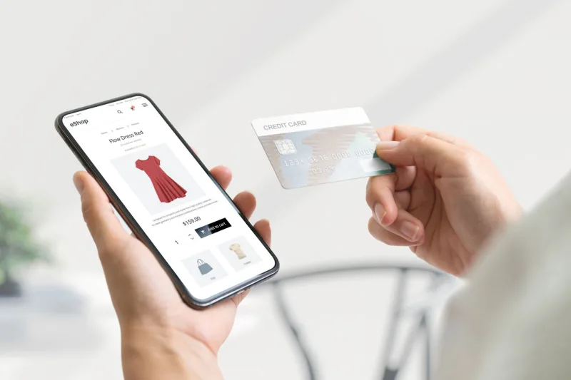 Shopping Online With Smart Phone And Credit Card Concept. Modern