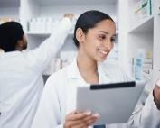Hospital Pharmacy Staff Using Technology For Inventory