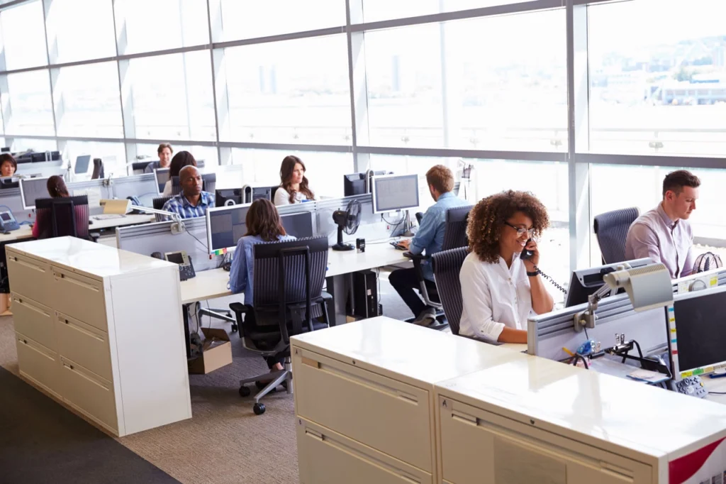 Innovate. Integrate. Elevate. Office Workers Cubicles 1024x682